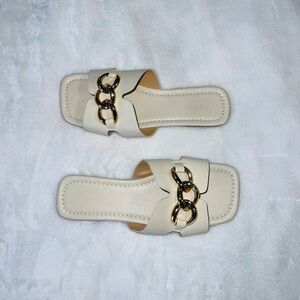CREAM SANDALS WITH GOLD CHAIN from Boutique in Saratoga